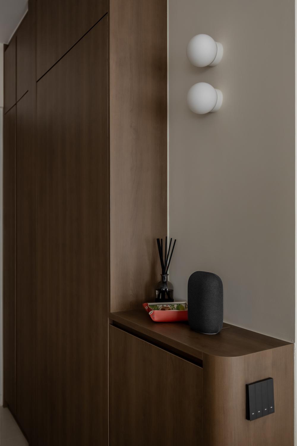 Minimalist Foyer with Console Table and Display Cabinets