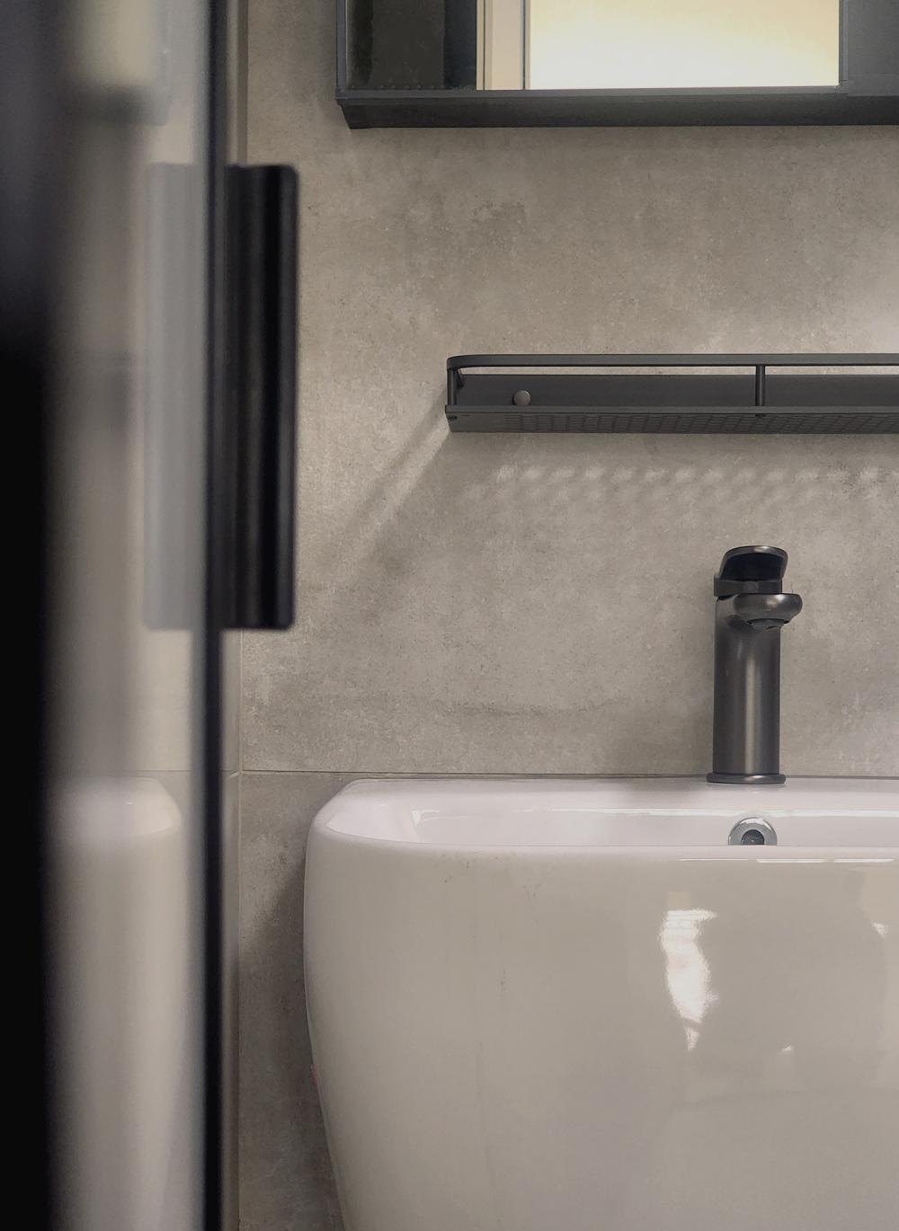 Minimalist Bathroom with Mirror and Bathroom Accessories
