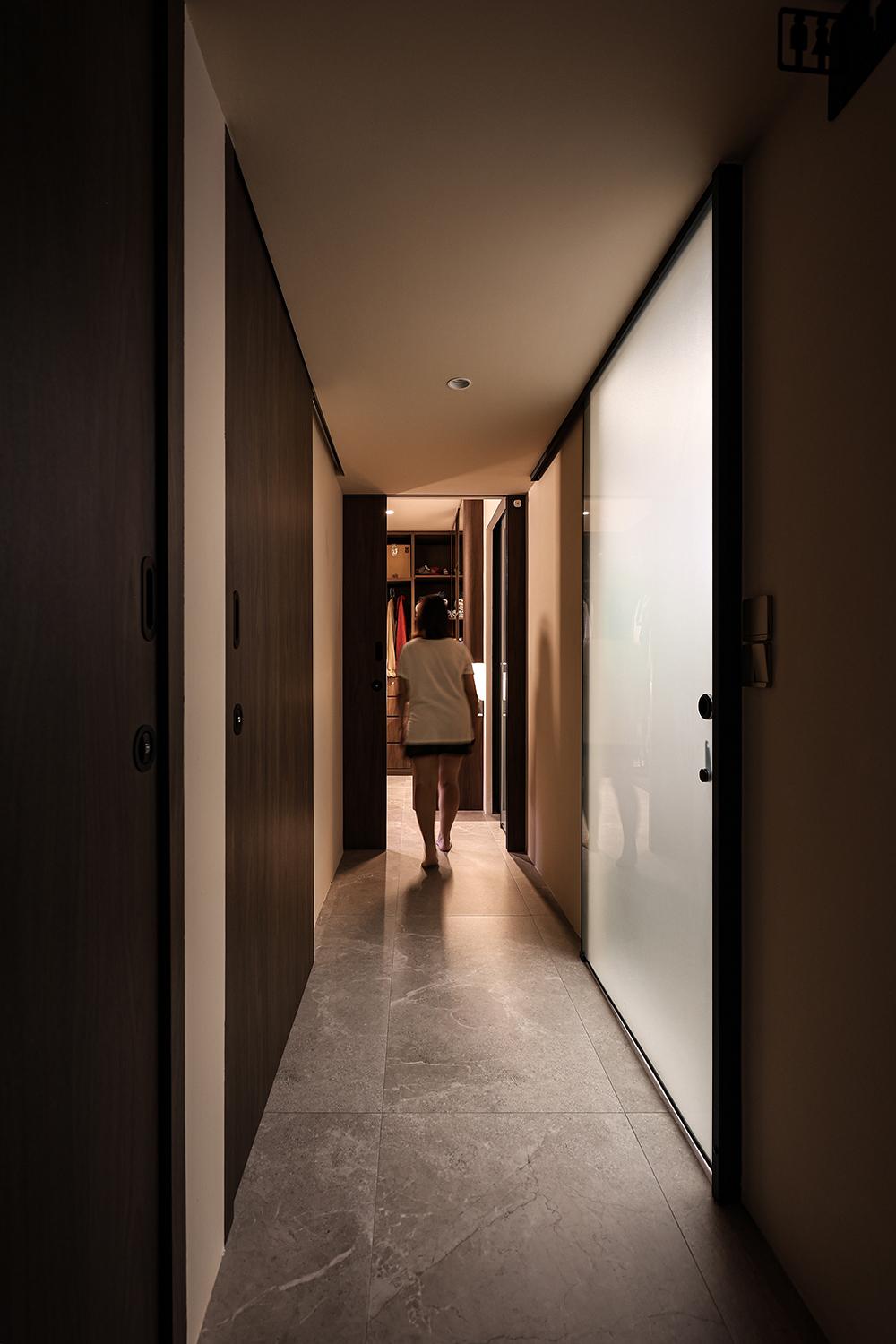 Eclectic Hallway with Homogeneous Tiles and Doors