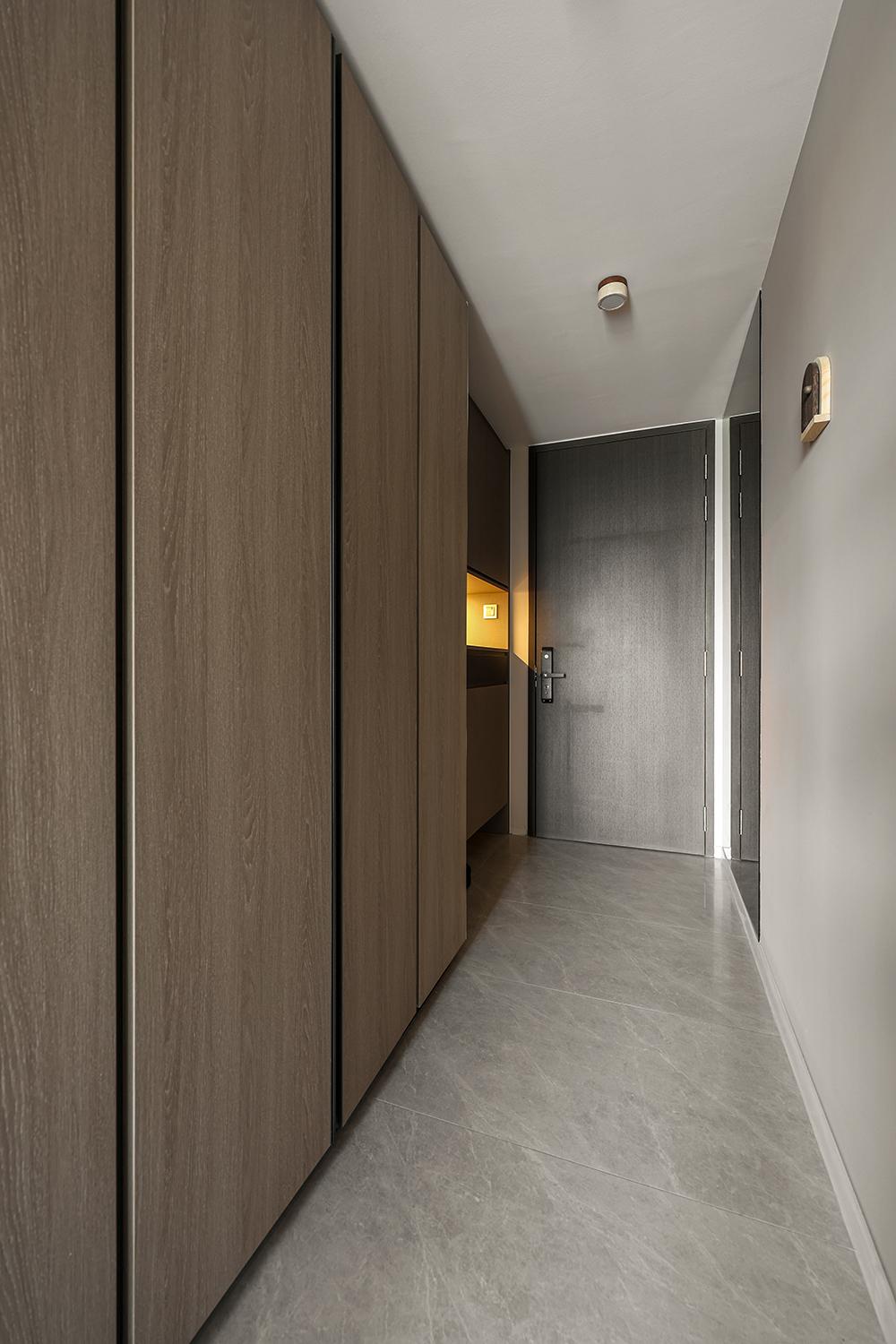 Modern Foyer with Mirror and Display Cabinets
