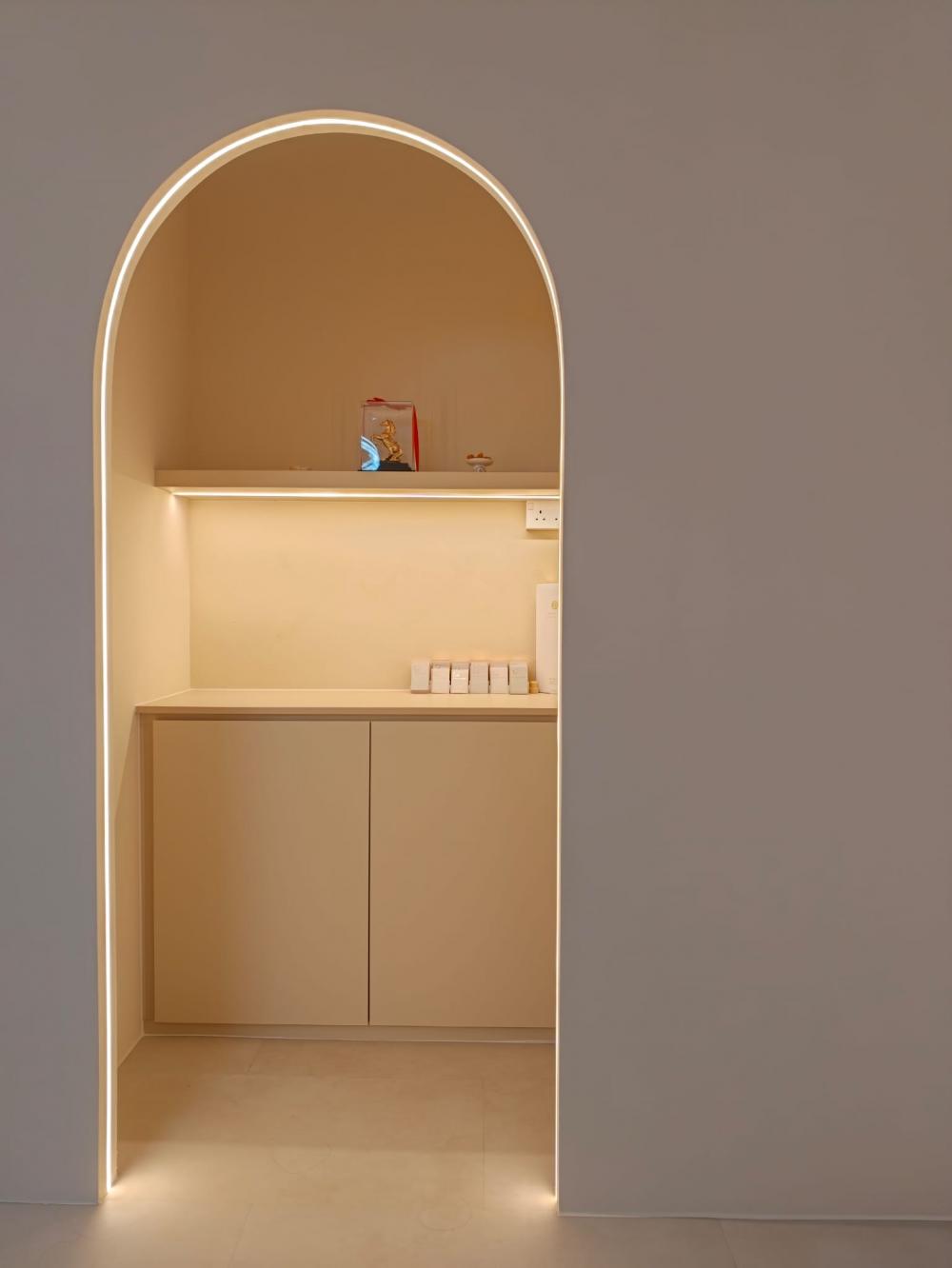 Minimalist Showroom with Storage Cabinets and Lighting