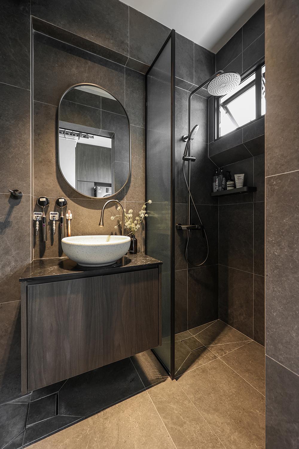 Industrial Bathroom with Homogeneous Tiles and Mirror