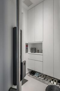 Minimalist Foyer at Breeze at The East