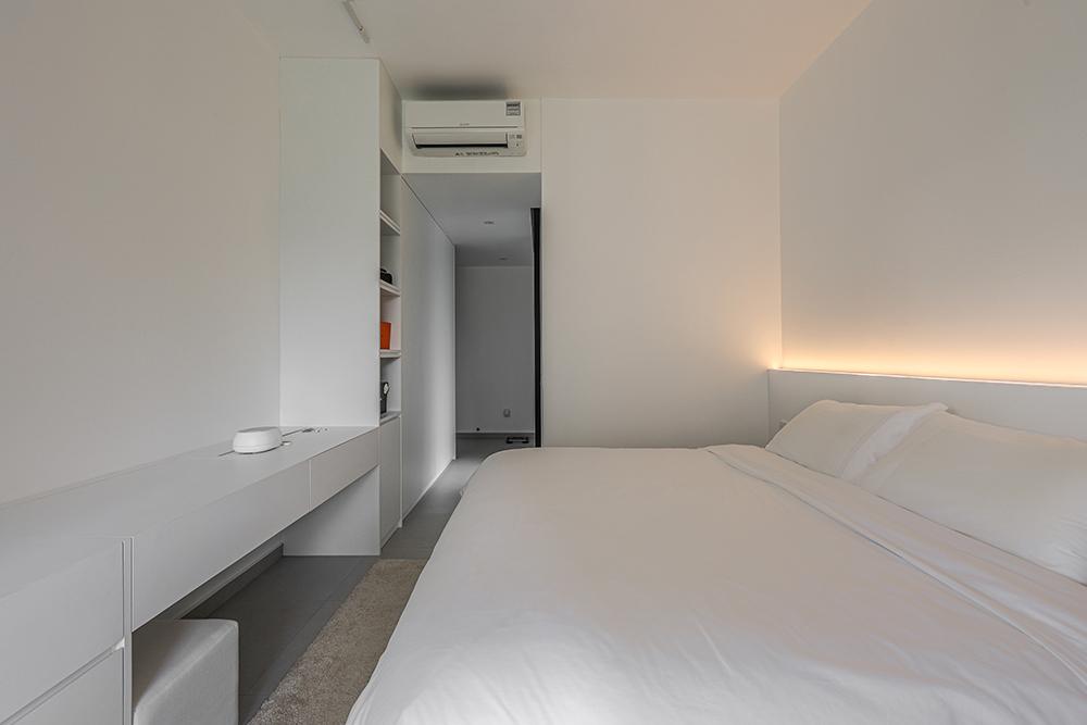 Minimalist Bedroom with Homogeneous Tiles and Wardrobe