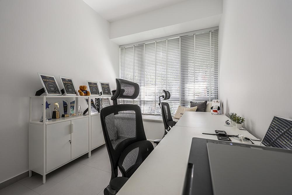 Minimalist Home Office with Desk and Storage Cabinets