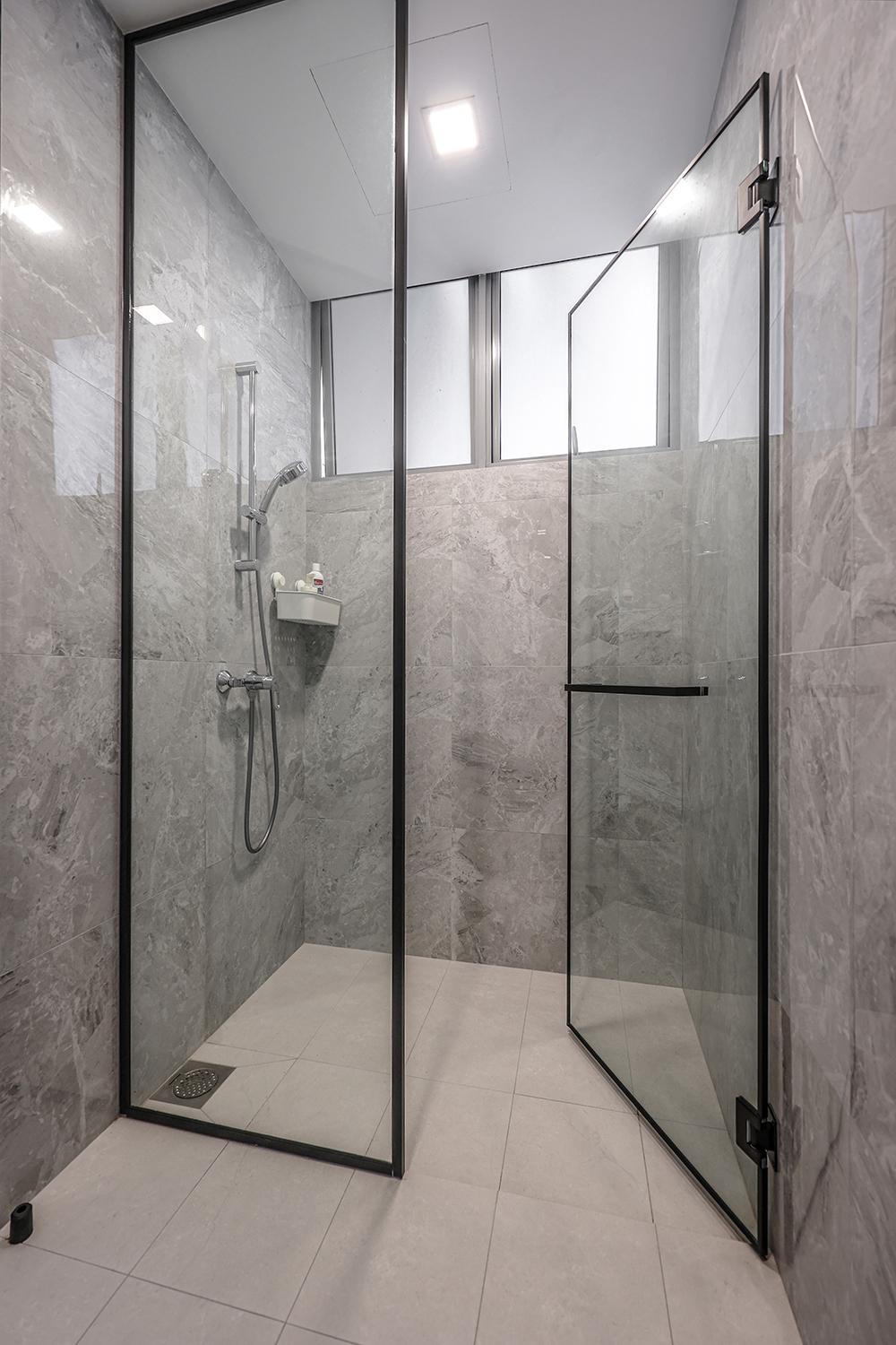 Minimalist Bathroom with Homogeneous Tiles and Shower Screen