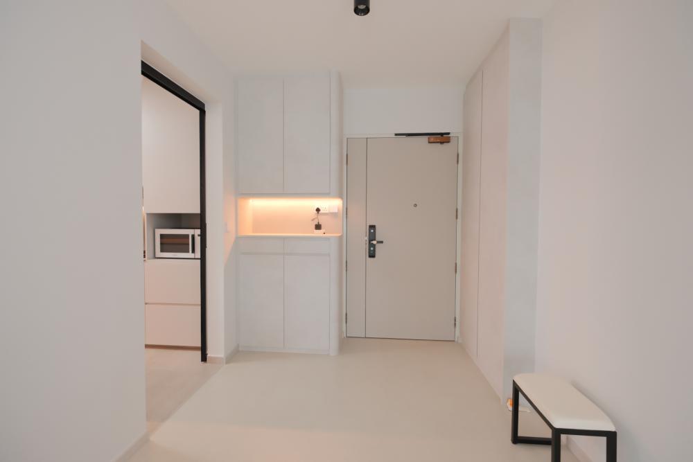 Minimalist Foyer with Artwork and Shoe Rack