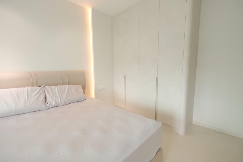 Minimalist Bedroom with Vinyl Flooring and Wardrobe