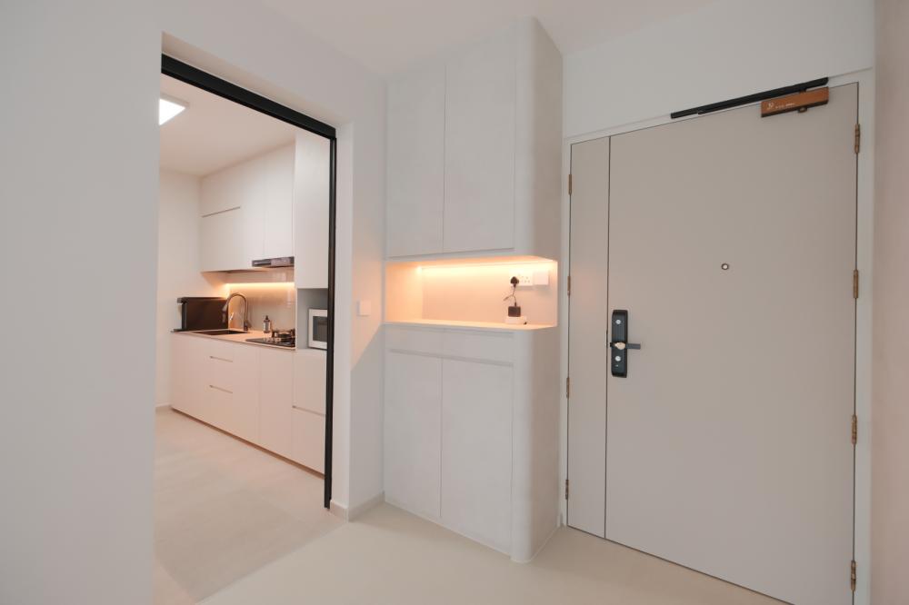 Minimalist Foyer with Artwork and Shoe Rack