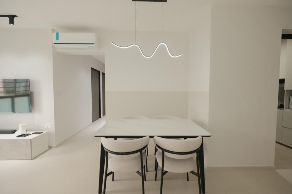 Minimalist Dining Room with Drop Light and Dining Chairs