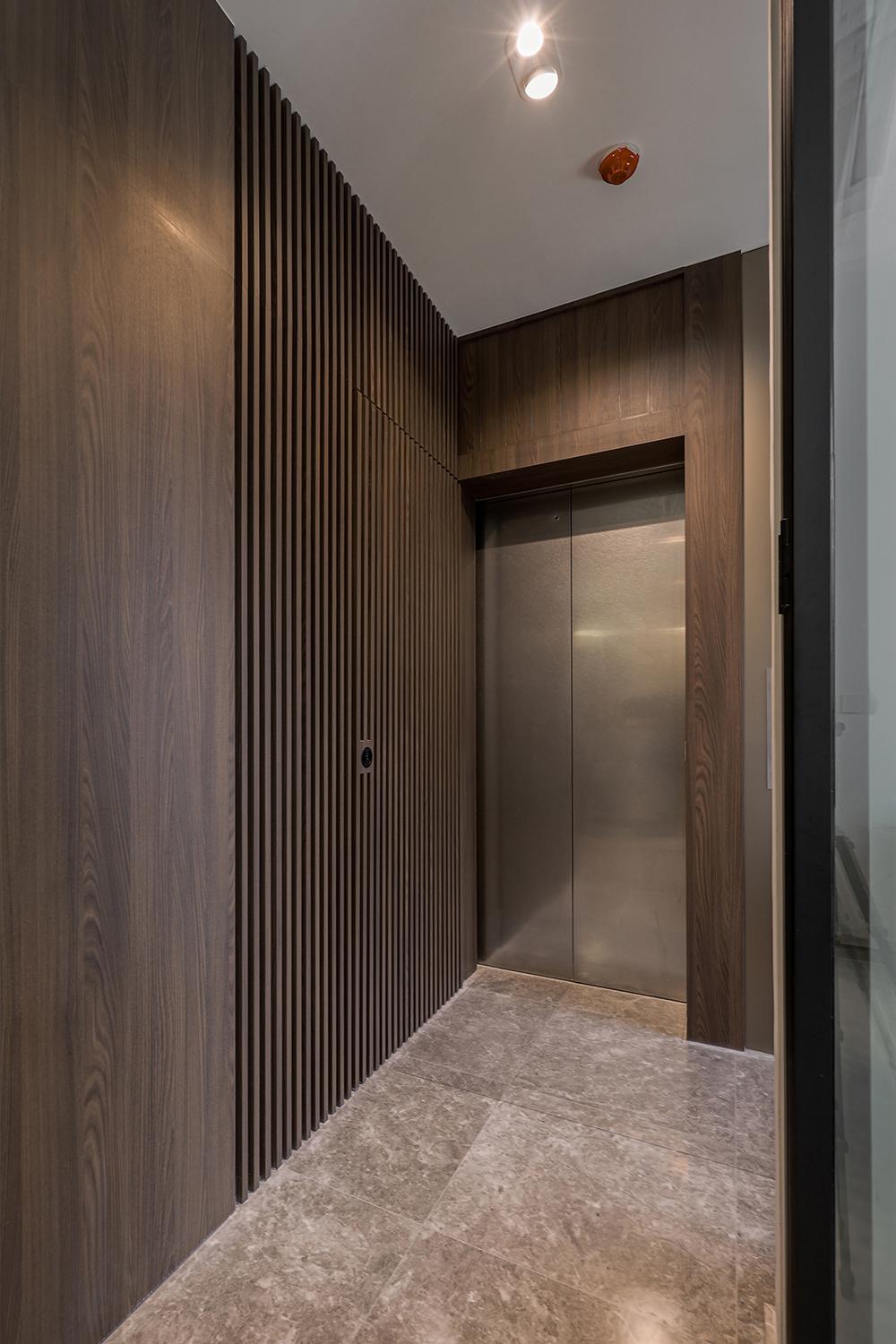 Modern Foyer with Feature Wall and Lighting