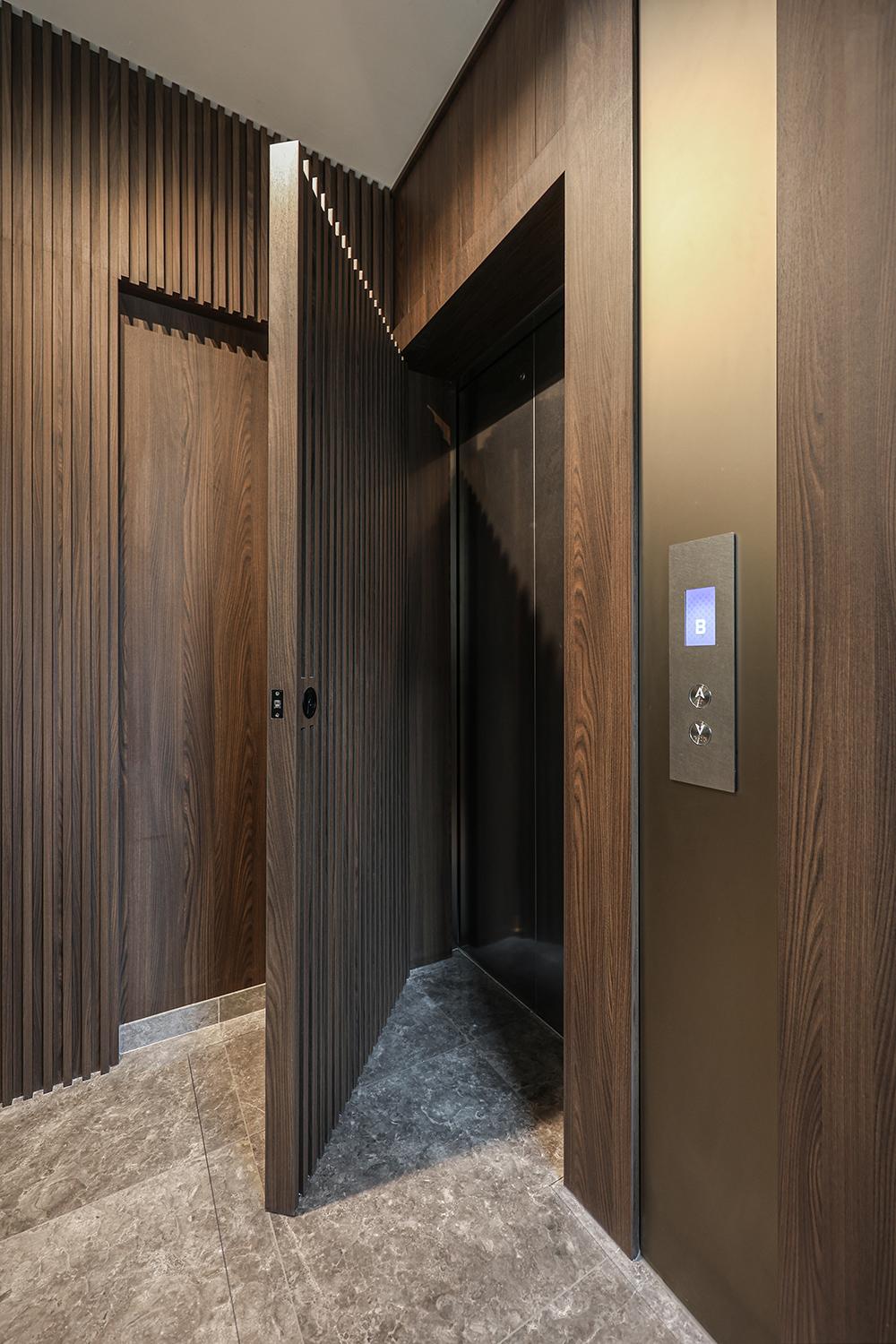 Modern Foyer with Feature Wall and Lighting