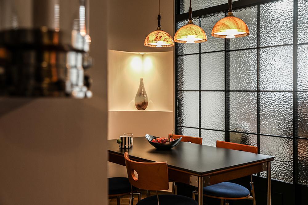 Asian Dining Room with Glass Door and Dining Table