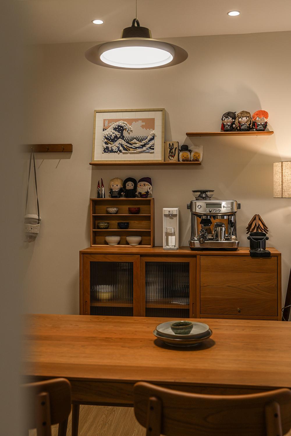 Scandinavian Dining Room with Artwork and Dining Table