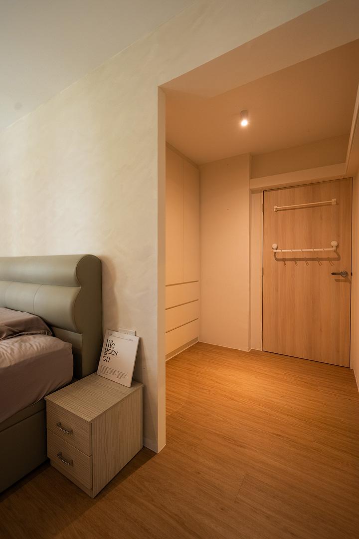 Scandinavian Bedroom with Herringbone Tiling and Cement Floor