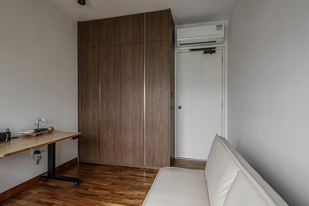 Modern Bedroom with Wardrobe and Sofa