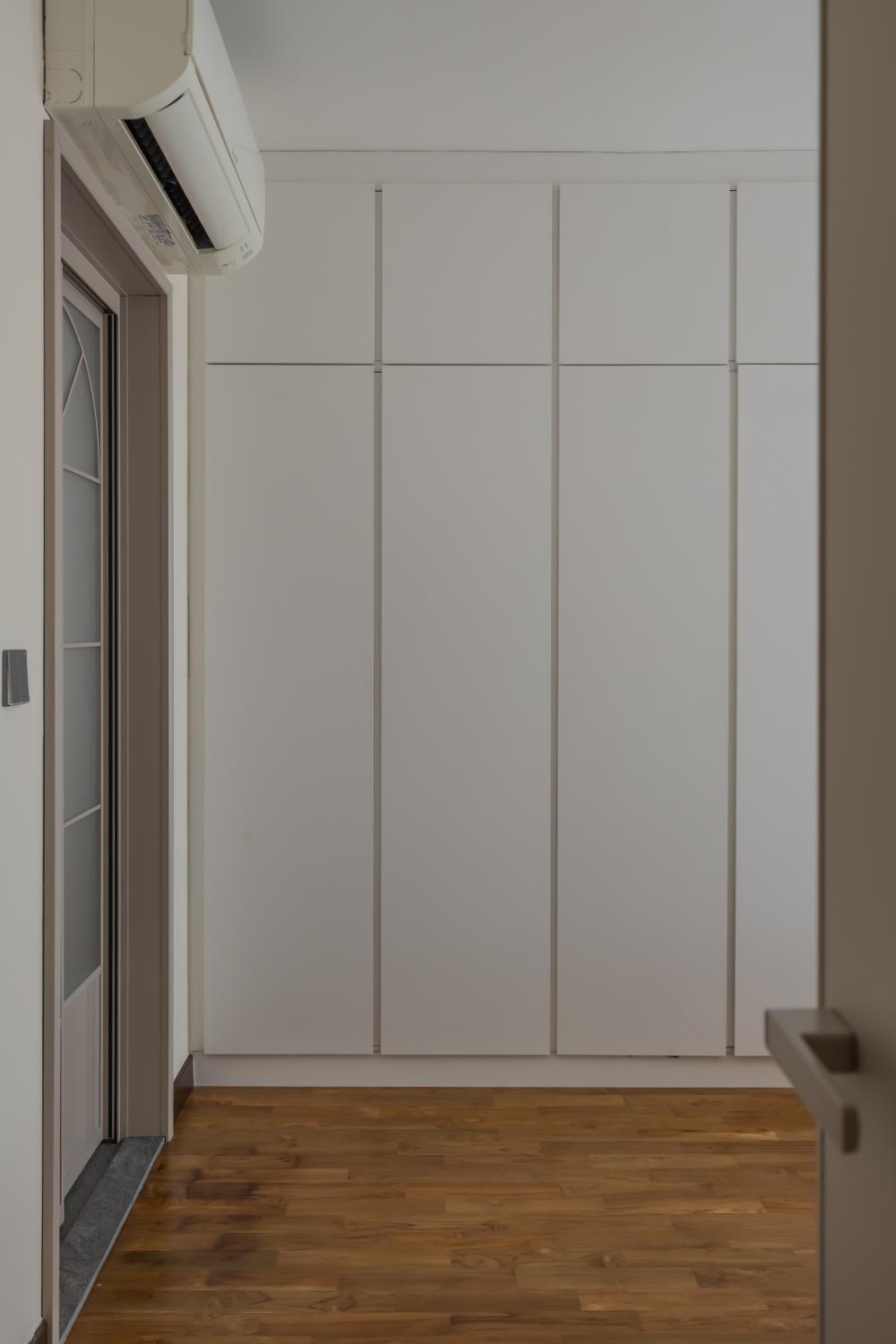 Contemporary Bedroom with Parquet Floor and Cove Lighting
