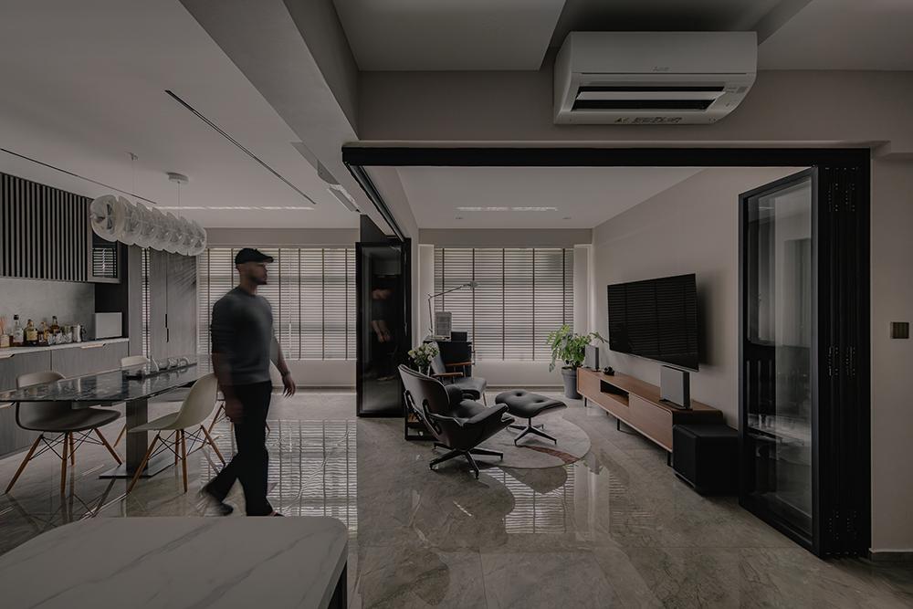 Modern Living Room with Homogeneous Tiles and Glass Door