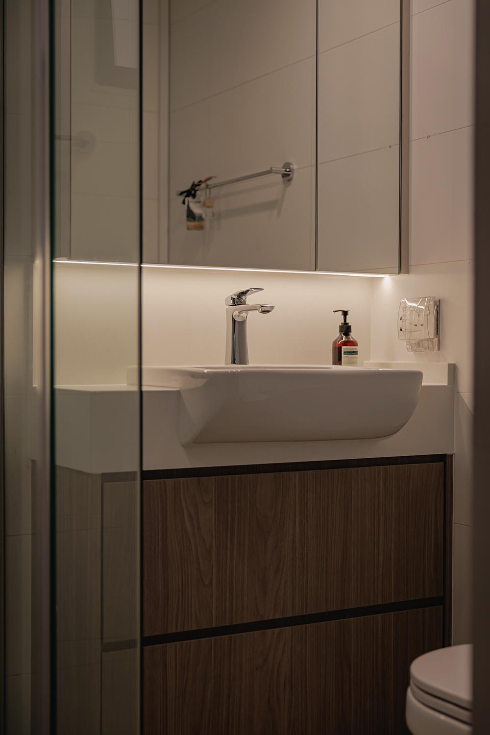 Minimalist Bathroom with Countertop and Mirror