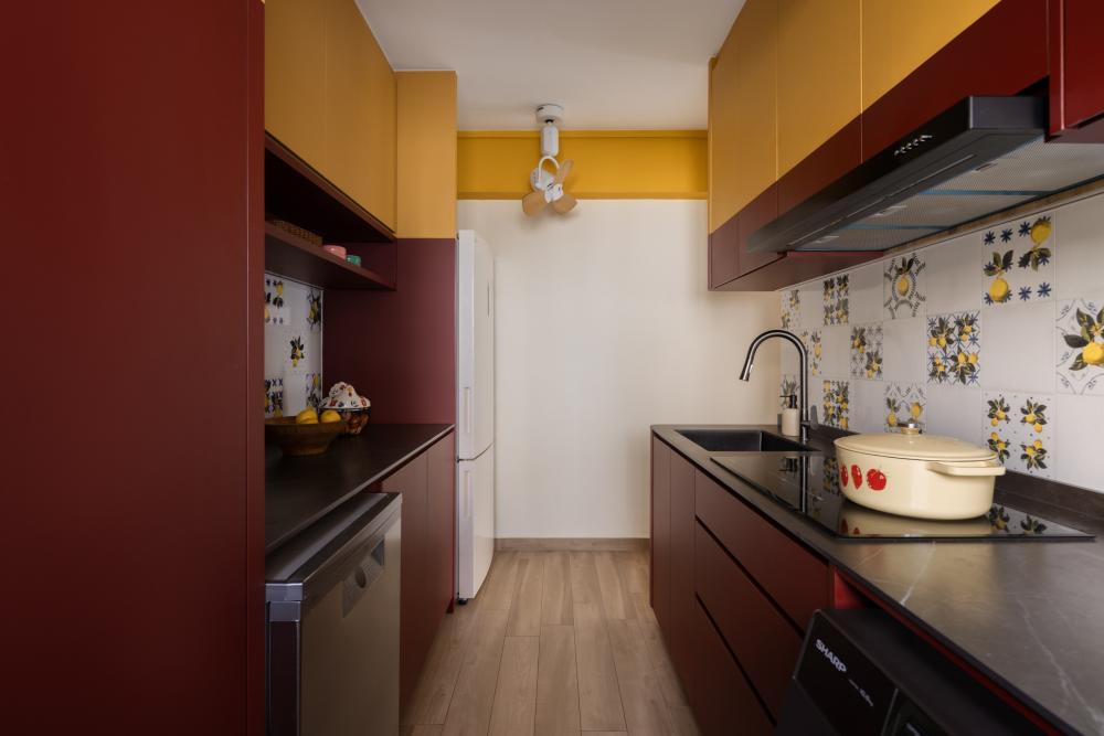 Eclectic Kitchen with Homogeneous Tiles and Cupboard
