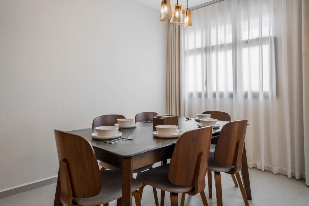 Contemporary Dining Room with Chandelier and Dining Table
