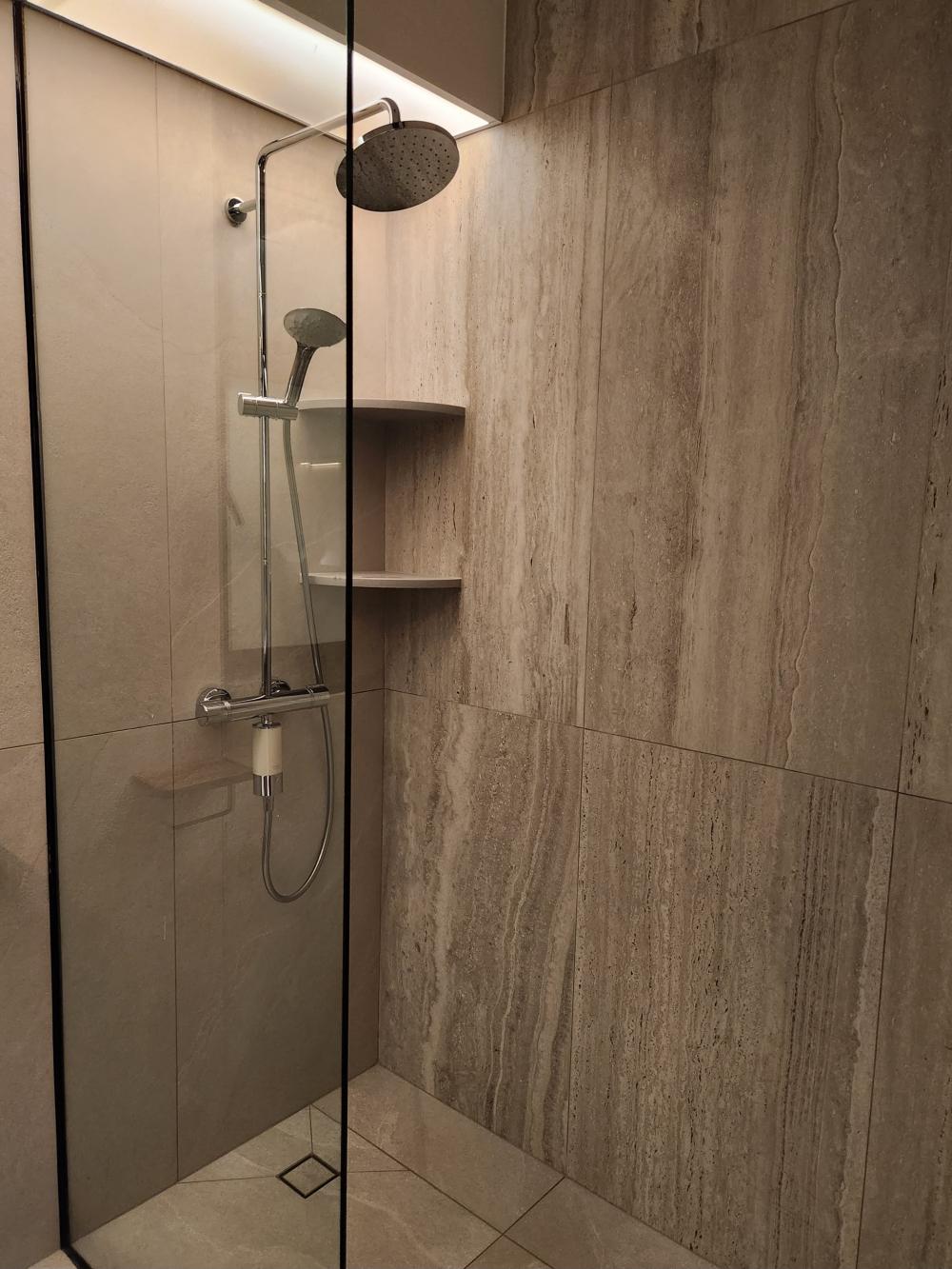 Scandinavian Bathroom with Shower Screen and Showers