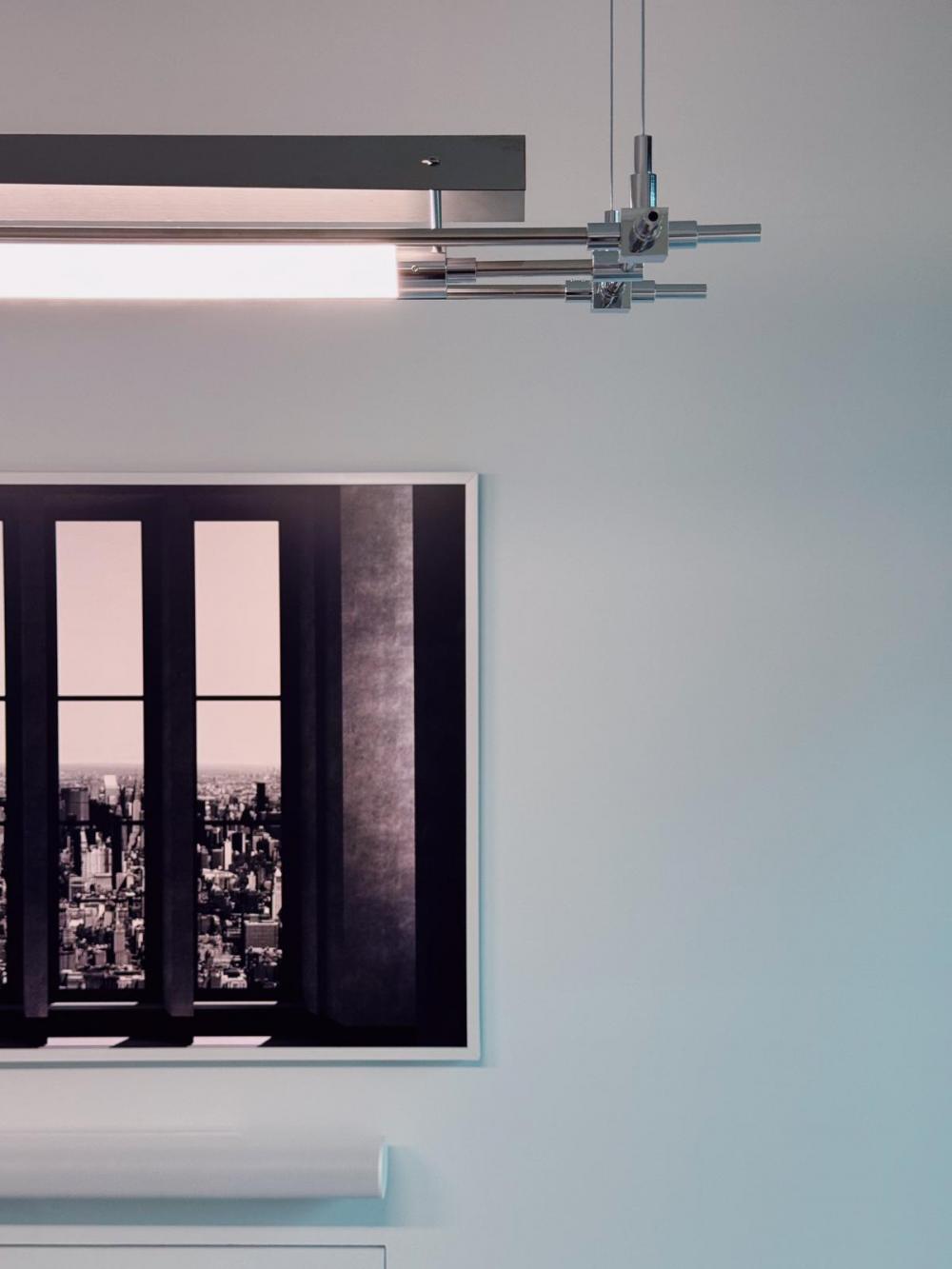 Industrial Dining Room with Artwork and Lighting