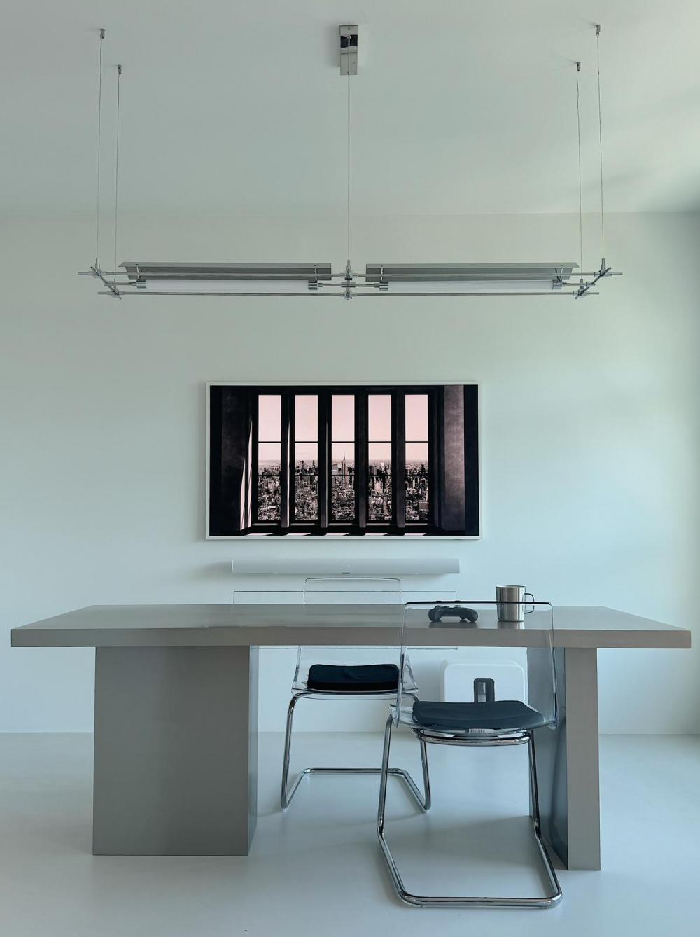 Industrial Dining Room with Cement Floor and Drop Light