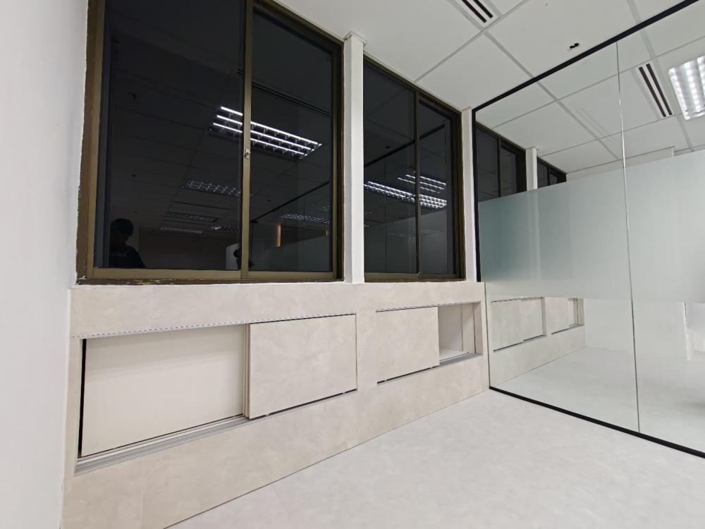 Contemporary Office with Vinyl Flooring and Glass Door