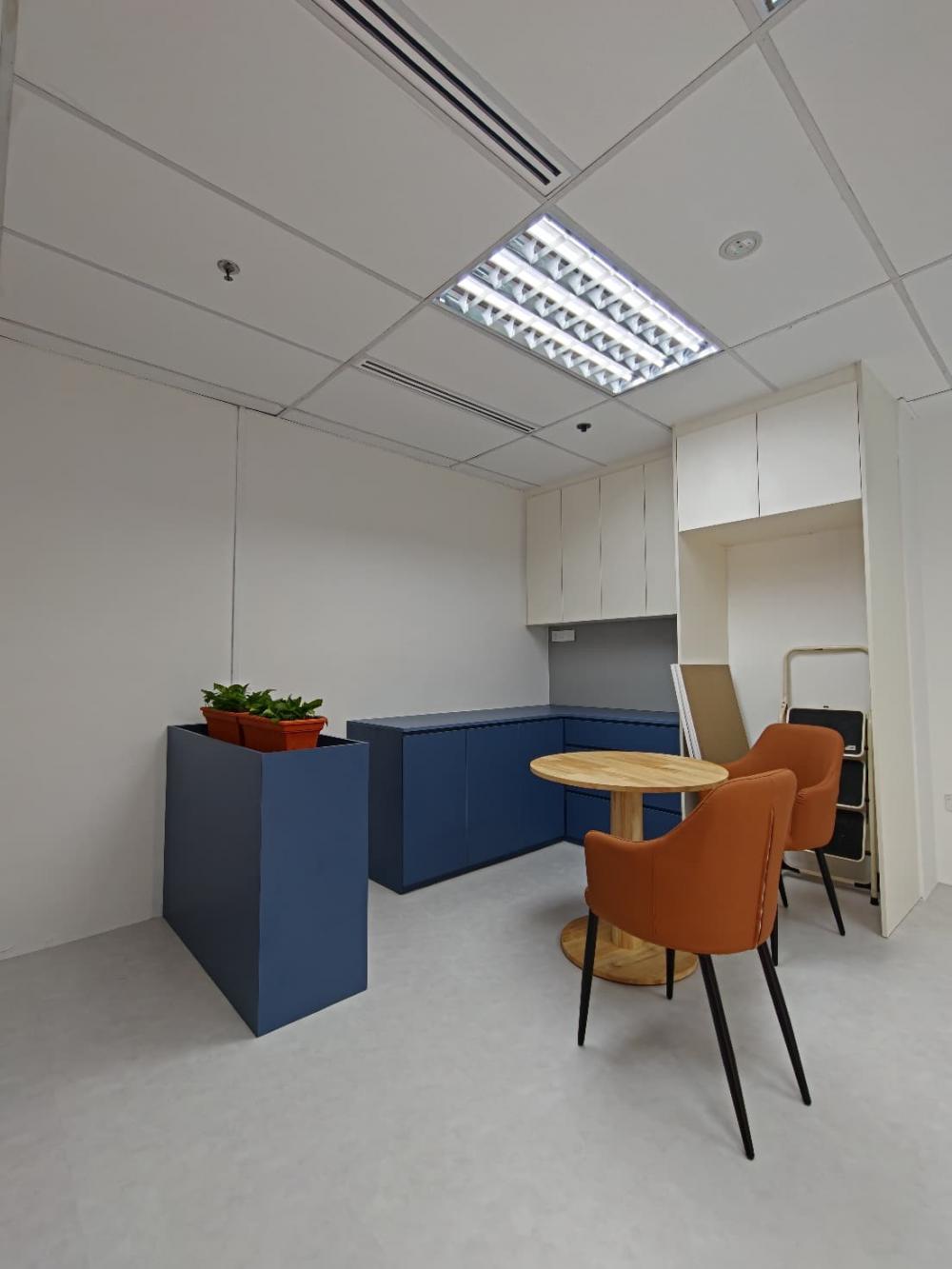 Contemporary Office with Dining Chairs and Coffee Table