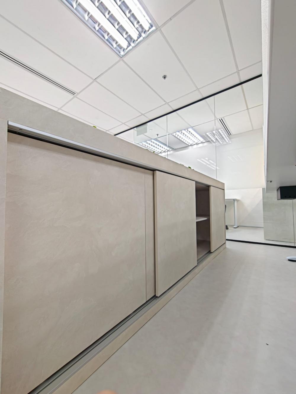 Contemporary Office with Vinyl Flooring and Glass Door
