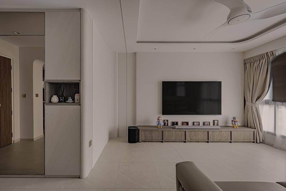 Modern Living Room with Homogeneous Tiles and TV Console