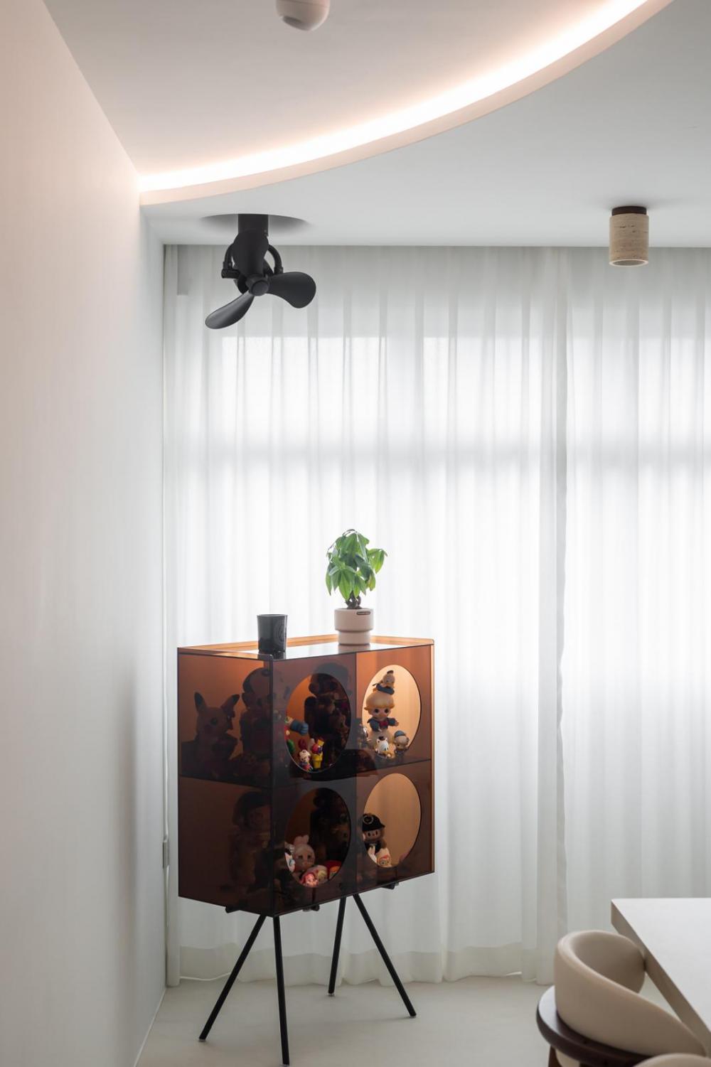 Modern Dining Room with Cove Lighting and Ceiling Fan