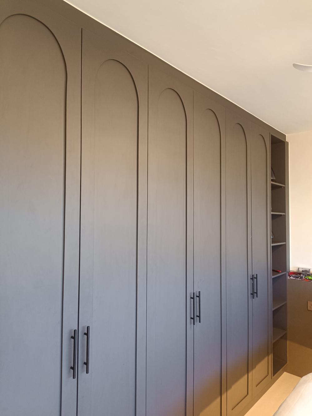 Transitional Bedroom with Bookshelf and Platform Bed