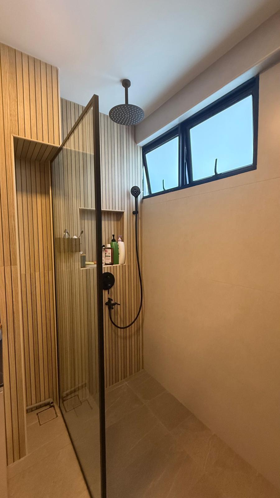 Transitional Bathroom with Homogeneous Tiles and Shower Screen