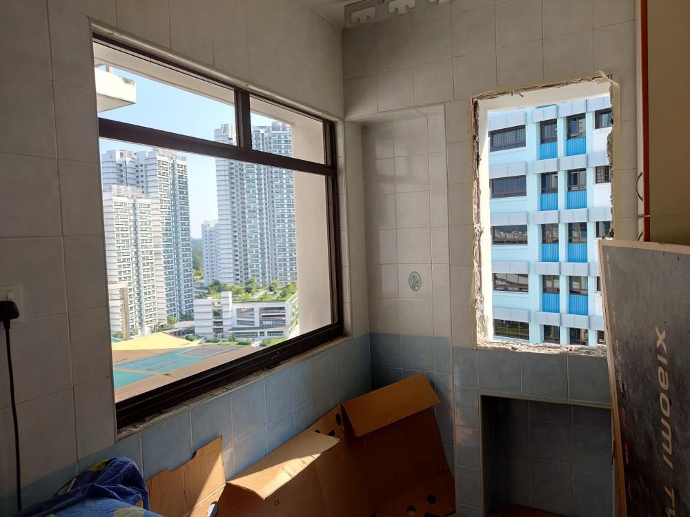 Asian Kitchen with Homogeneous Tiles and Kitchen Window