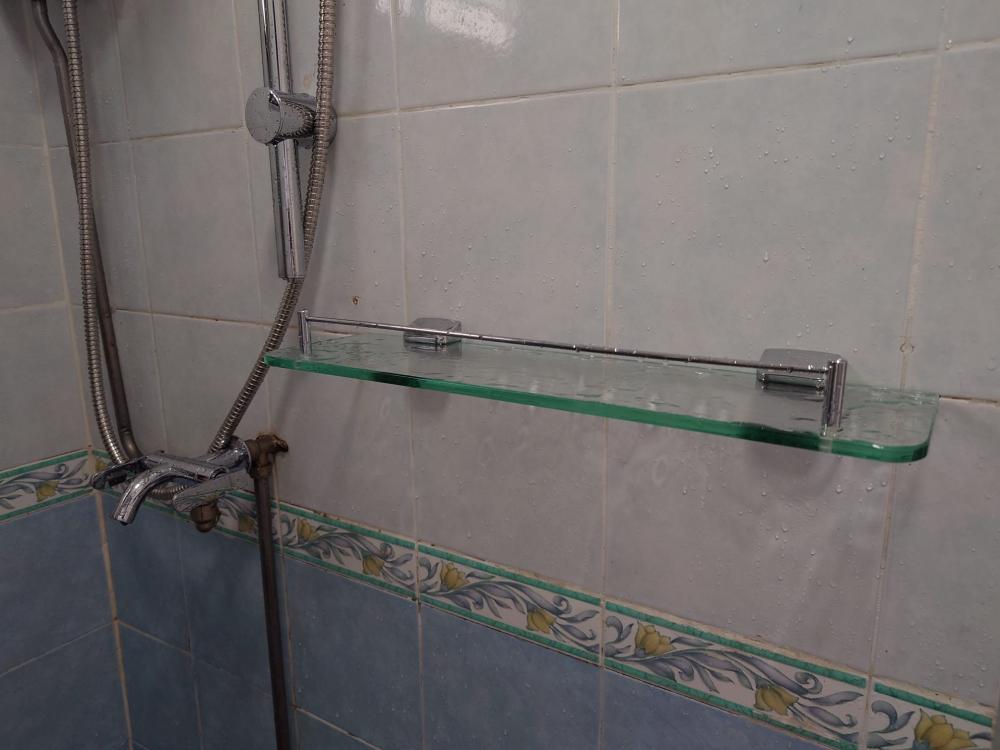 Asian Bathroom with Mirror and Bathroom Storage