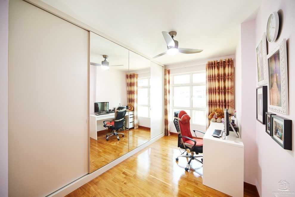 Contemporary Home Office with Desk and Bookcases