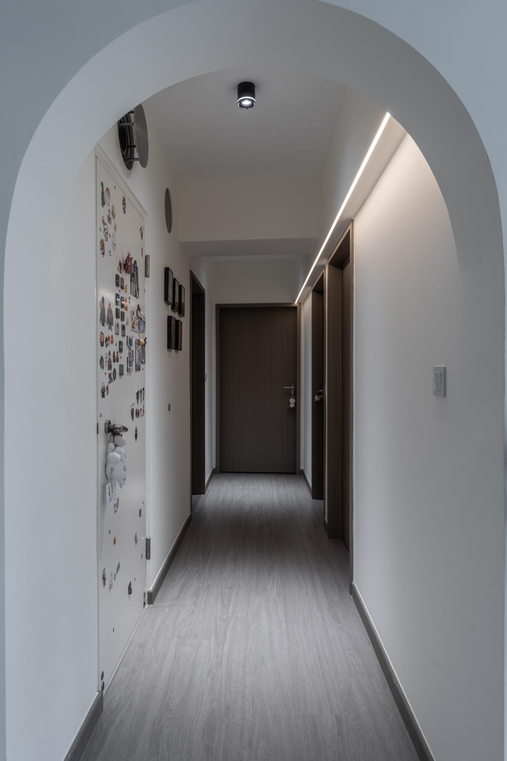 Contemporary Hallway with Bookshelf and Artwork