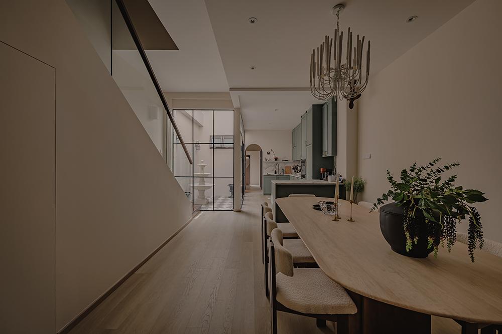 Minimalist Dining Room with Vinyl Flooring and Glass Door