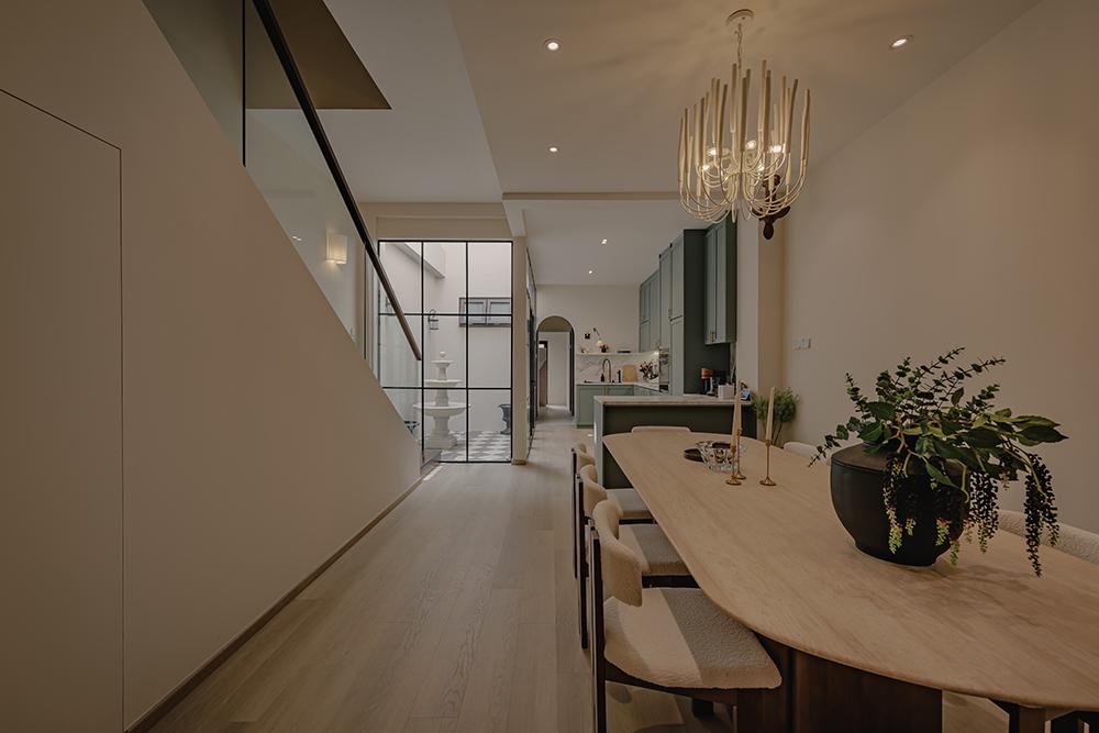 Minimalist Dining Room with Vinyl Flooring and Glass Door