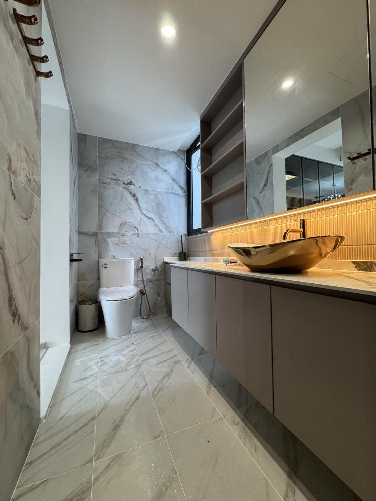 Modern Bathroom with Countertop and Herringbone Tiling