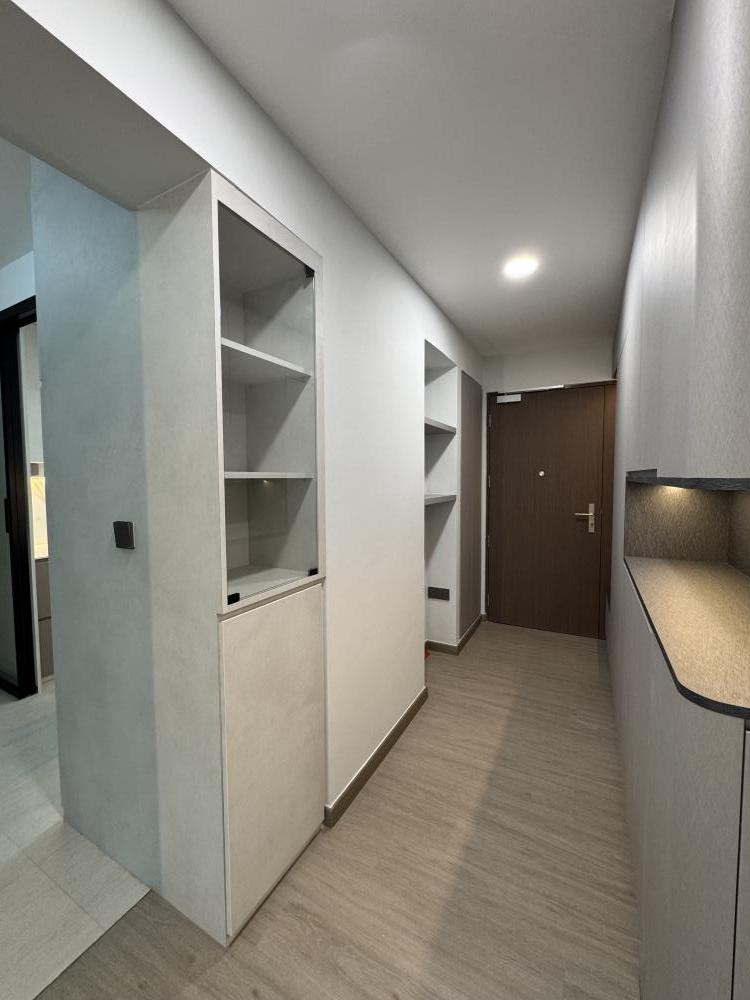 Modern Entryway with Display Cabinets and Open Storage