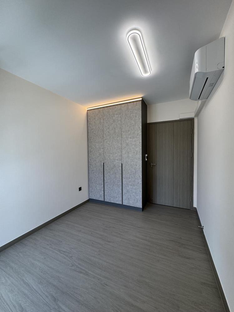 Modern Bedroom with Cove Lighting and Wardrobe