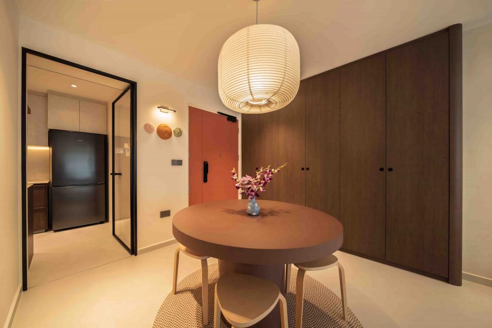 Minimalist Dining Room with Drop Light and Dining Table