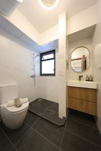 Minimalist Bathroom at 4 Room BTO @ Tampines Green Jade