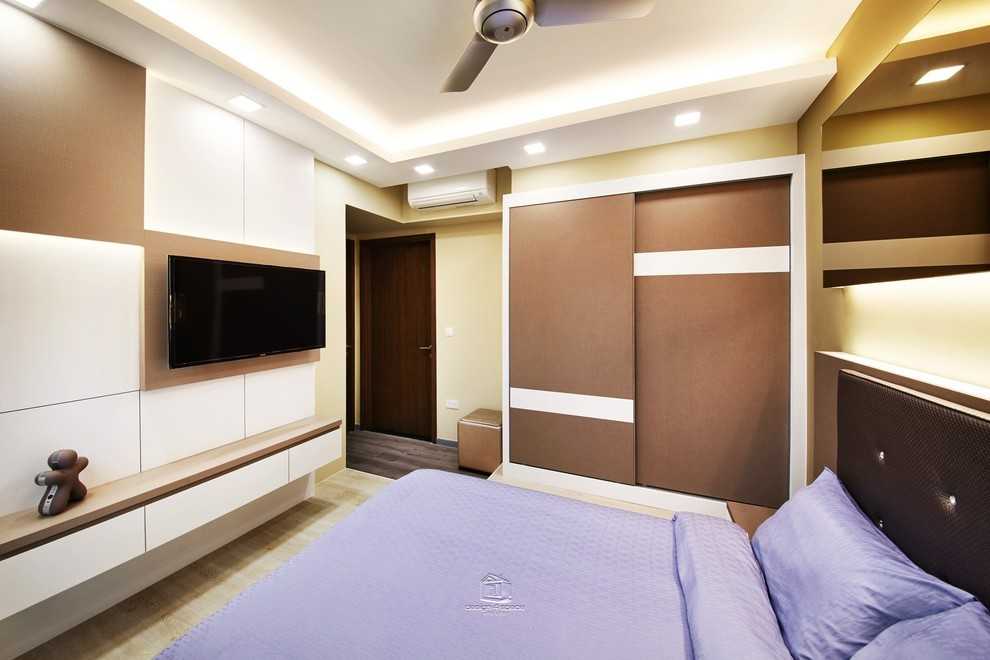 Contemporary Bedroom with Cove Lighting and Wardrobe