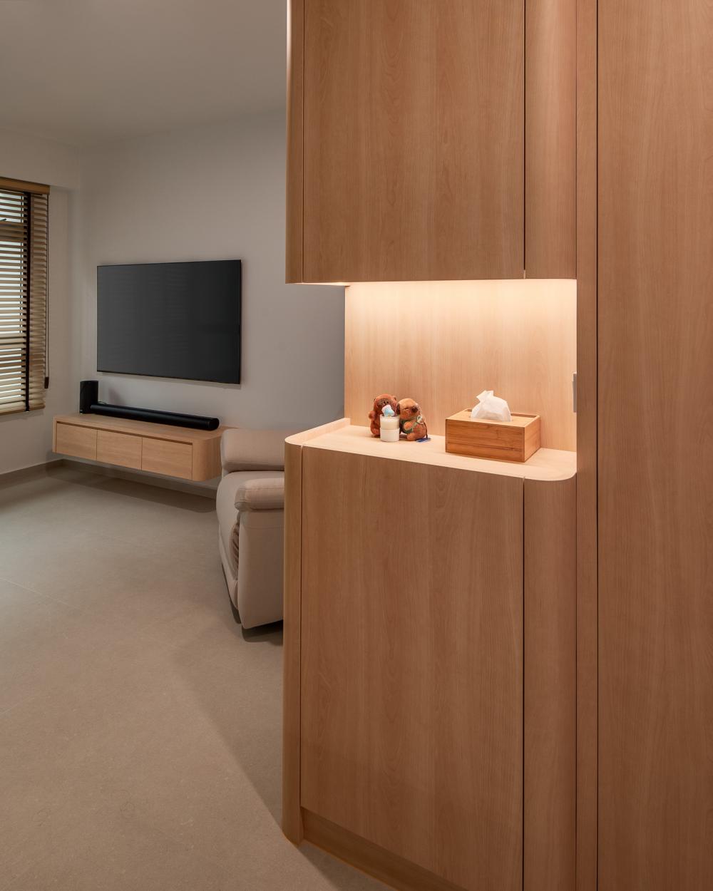 Scandinavian Foyer with Cove Lighting and Artwork