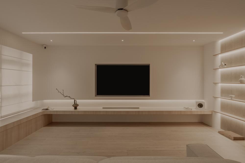 Minimalist Living Room with TV Console and Cove Lighting