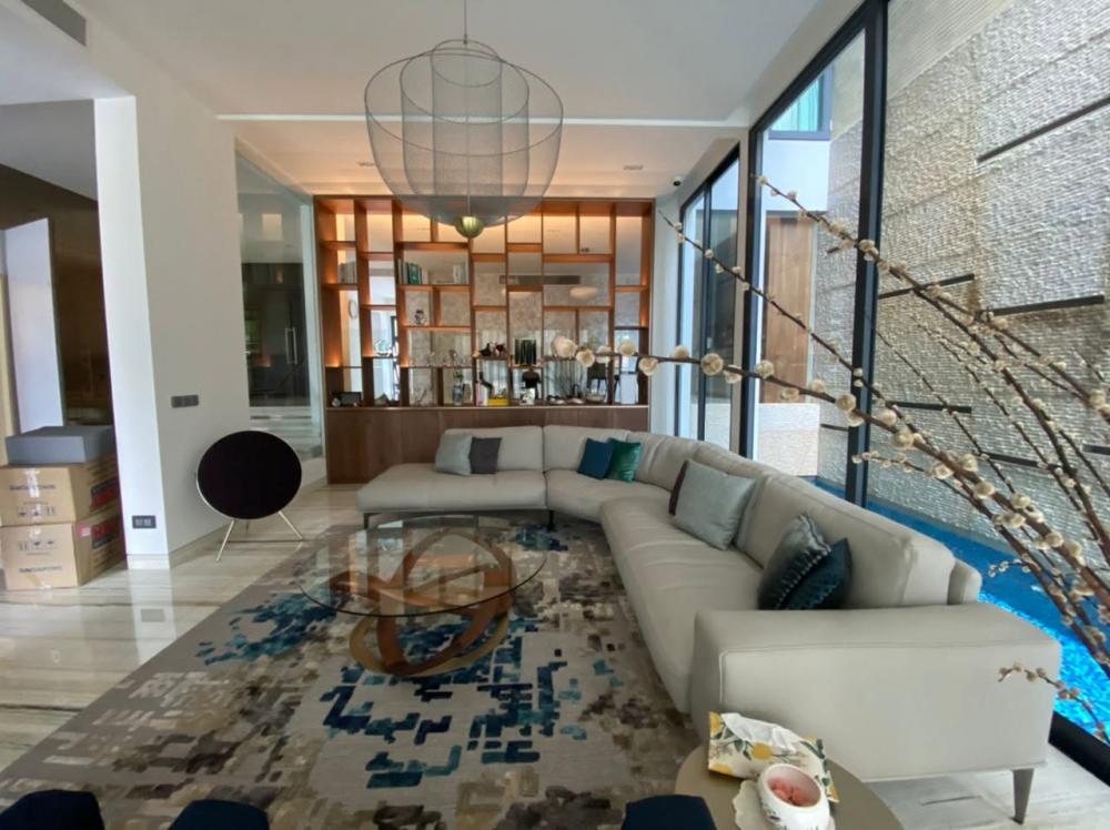Contemporary Living Room with Marble Floor and Feature Wall